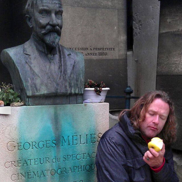 Director Erik van Schaaik having a sad little apple at Georges Mélies' grave, at the beginning of production. It's a sign!